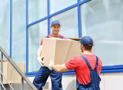 Professional office removals planning in Rushgreen with moving team and office furniture
