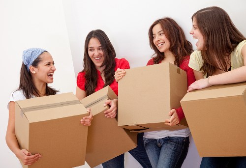 Rushgreen packing team organizing fragile belongings for transport