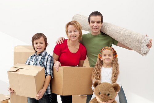 Organised boxes and furniture in household storage in Rushgreen