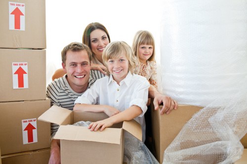 Packed moving boxes ready for local removals in Rushgreen